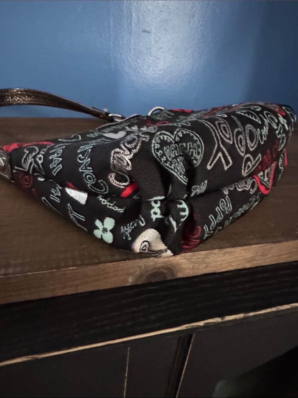 Coach Black Poppy Graphic Mini Wristlet with Red & Light Blue Accents - Picture 8 of 10